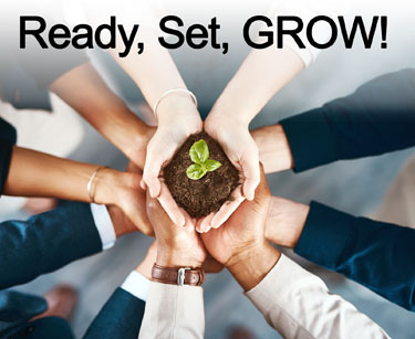 Ready, Set, GROW! Image of people holding a small plant
